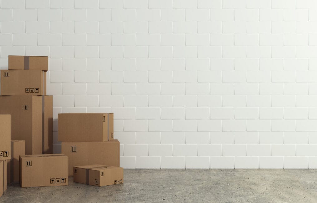 Cardboard moving boxes packed and taped for a long distance move