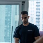 Moving Co. mover standing in a condo during a move